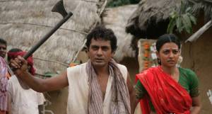 Nawazuddin Siddiqui and Radhika Apte in a scene from Manjhi-The Mountain Man